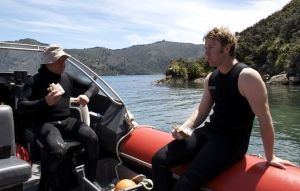 Tom (right) on a pāua research trip  during his PhD
