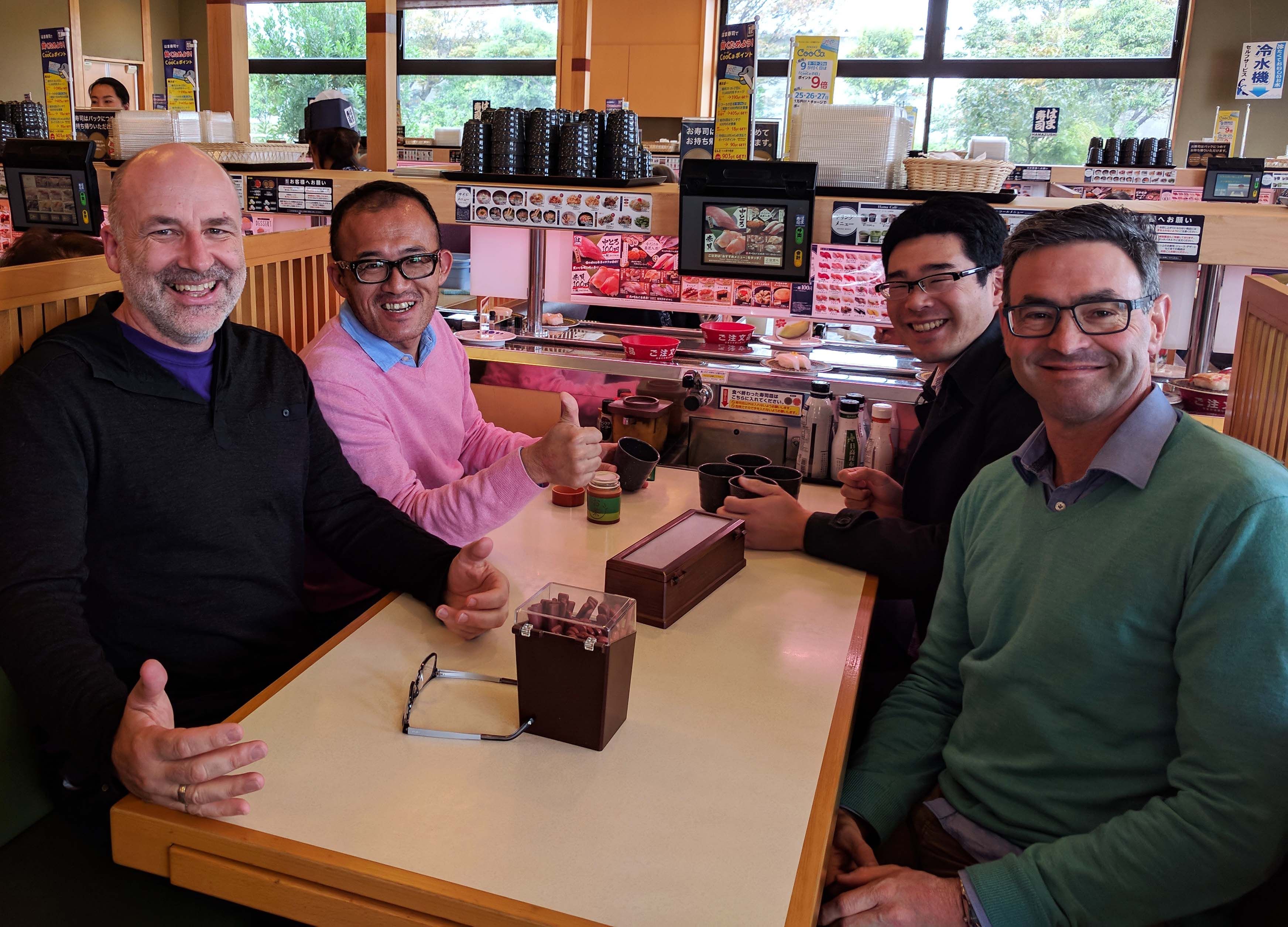From left: Edward, Oshima-san, Katsumata-san and Nathan getting ready for the mechanical sushi in Shizuoka.